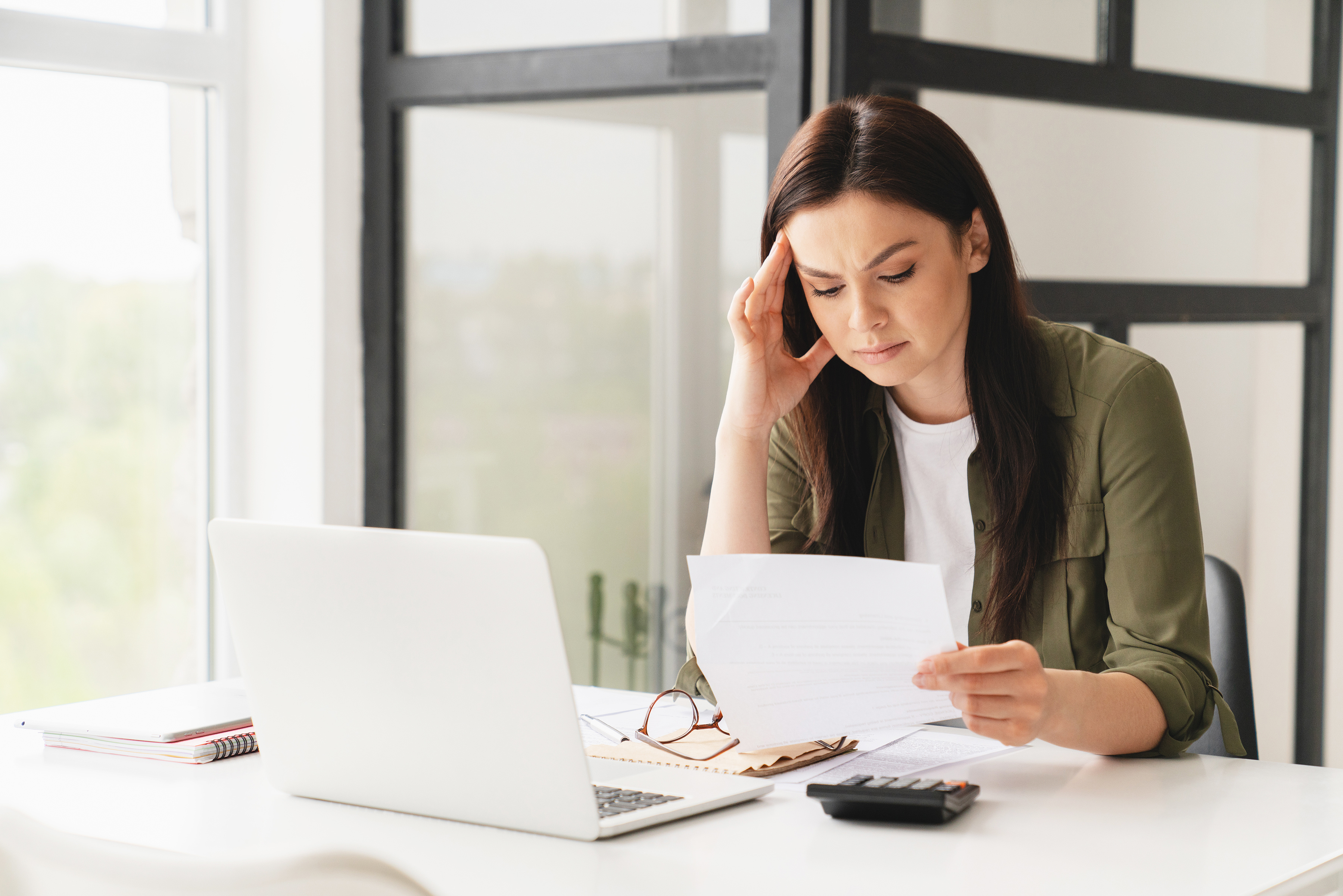 Professional Woman Stressed_shutterstock_2020155863